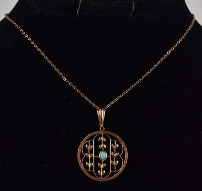 Lot 1332 - An Edwardian Art Nouveau 9ct yellow gold opal...