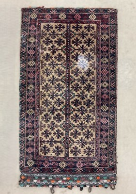 Lot 884 - A Buluchistan rug with a Kilim rug sewn to the...