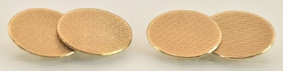 Lot 1398 - A pair of 9ct yellow gold oval cufflinks, with...