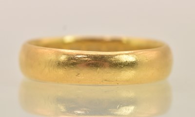 Lot 1217 - A 22ct yellow gold band ring, size P, approx 5....
