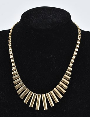 Lot 221 - An Italian yellow metal Cleopatra type fringe...