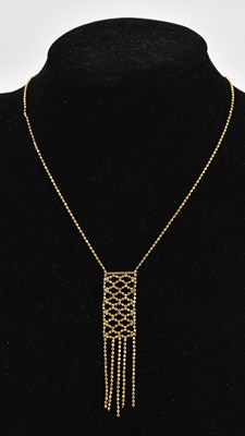Lot 309 - A 9ct yellow gold beaded necklace with...