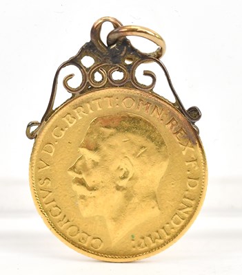 Lot 672 - A George V full sovereign, 1915, in a yellow...