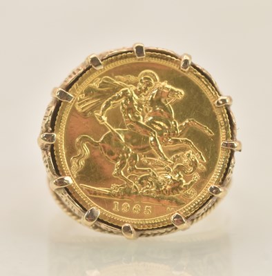 Lot 1198 - An Elizabeth II full sovereign, 1965, set in a...