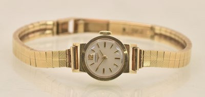 Lot 1519 - LONGINES; a lady's 9ct yellow gold wristwatch,...