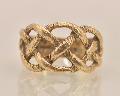 Lot 1275 - A 9ct yellow gold ring, the top with a...