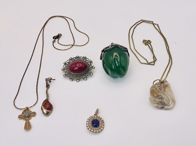 Lot 684 - A small group of costume jewellery, to include...