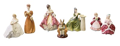 Lot 556 - ROYAL DOULTON; five assorted porcelain figures...