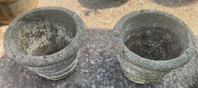 Lot 900 - A pair of reconstituted plant pots, height...