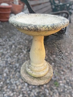 Lot 760 - A reconstituted concrete bird bath, with moon...