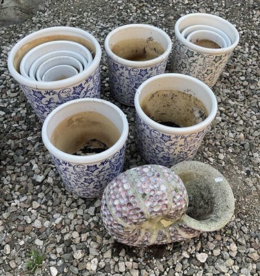 Lot 903 - Eleven stone glazed blue and white plant pots...