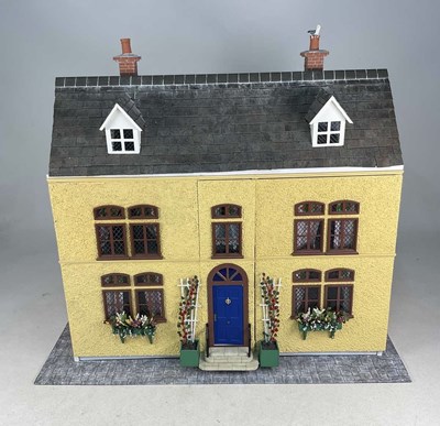Lot 63 - A large scratch built doll's house with...