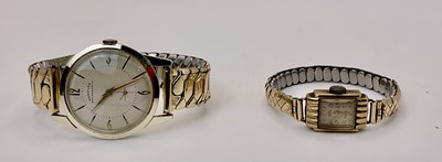 Lot 719 - A vintage 9ct gold lady's wristwatch on a...