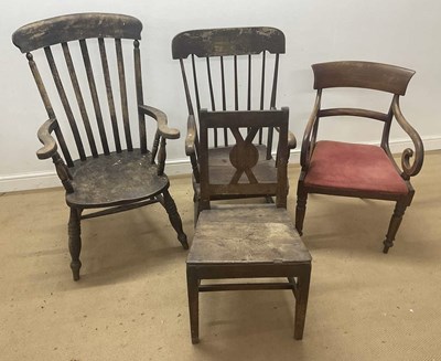 Lot 822 - An elm and beech Windsor armchair, height...