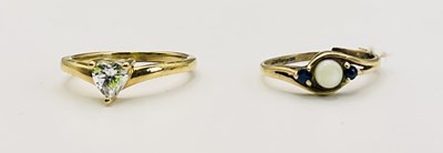 Lot 678 - A 9ct yellow gold seed pearl and blue topaz...