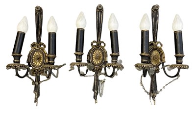 Lot 150 - A set of three early 20th century black...