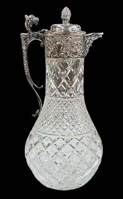 Lot 1062 - An early 20th century cut crystal glass silver...
