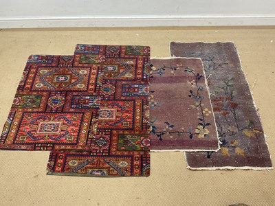 Lot 885 - Two geometric rugs with central medallions,...