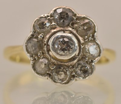Lot 1222 - An 18ct yellow gold diamond flower head...