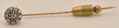 Lot 1387 - An early 20th century yellow metal diamond set...