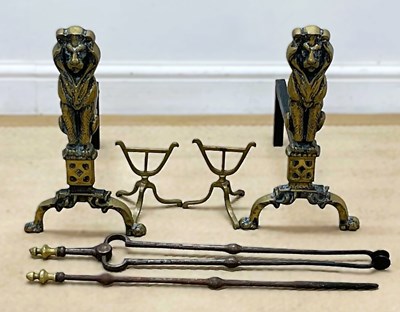 Lot 756 - A pair of brass andirons in the form of lions,...