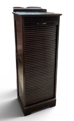 Lot 104 - An early 20th century mahogany tambour fronted...
