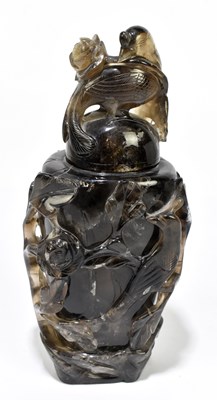 Lot 1194 - A Chinese carved agate vase and cover, the...