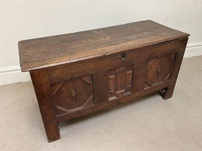 Lot 63 - An early 18th century oak coffer, with...
