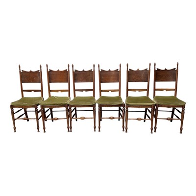 Lot 52 - A set of six Arts and Crafts oak dining chairs,...