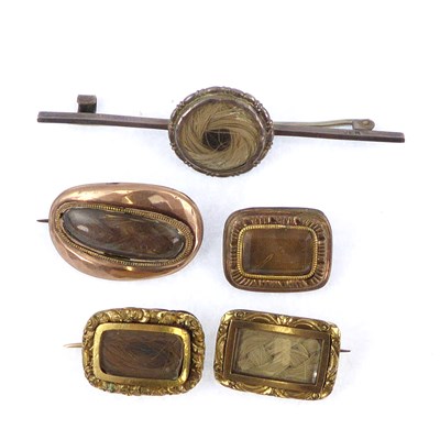 Lot 1004 - Five 19th century mourning brooches, all with...