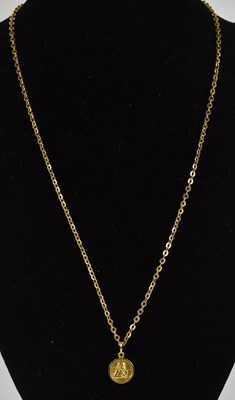Lot 1355 - An 18ct yellow gold necklace, with small...
