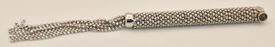 Lot 1308 - An 18ct white gold cylindrical necklace...