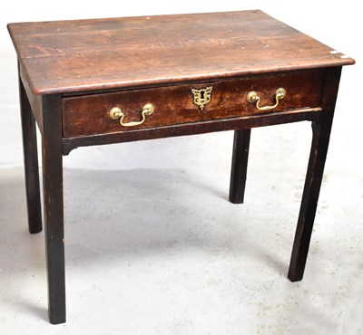 Lot 20 - A Georgian oak side table with a pair of...