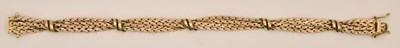 Lot 1407 - A 9ct yellow gold four strand bracelet, with...