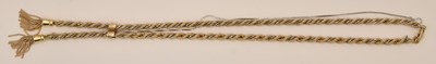 Lot 1309 - A 9ct yellow and white gold twist necklace...