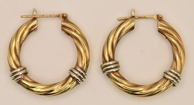Lot 1361 - A pair of large 9ct yellow gold twist hoop...