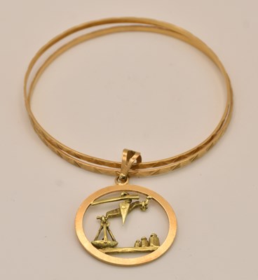 Lot 1410 - A pair of matching yellow gold bangles, with...