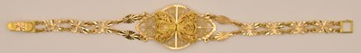 Lot 1411 - A Middle Eastern yellow metal bracelet, with...