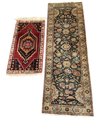 Lot 134 - A modern handmade wool pile Indian runner, the...