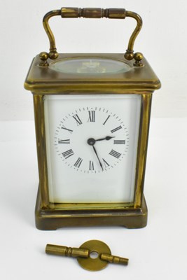 Lot 172 - A 20th century brass carriage clock, with...