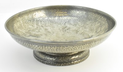 Lot 485 - TUDRIC; a hammered pewter fruit bowl, stamped '...