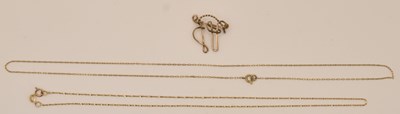 Lot 1189 - A 10K yellow gold fine dainty link necklace,...