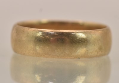 Lot 1267 - A 9ct yellow gold band ring, size K, approx 3g.