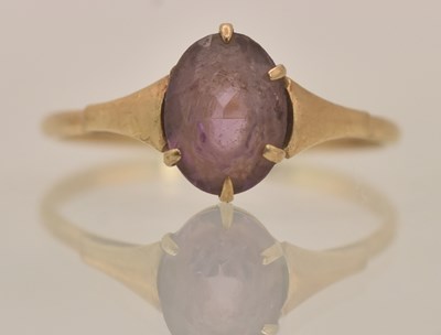 Lot 1344 - A 9ct yellow gold amethyst set dress ring, the...