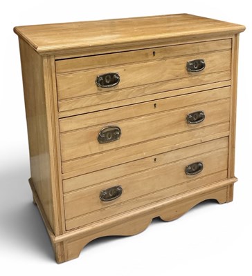 Lot 99 - An Edwardian pine three drawer chest of...