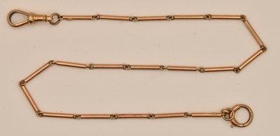 Lot 1426 - A 9ct rose gold bar link bracelet, with swivel...
