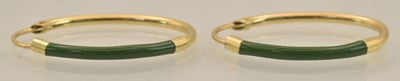Lot 1370 - A pair of handmade 18ct yellow gold and green...