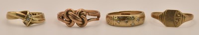 Lot 1239 - Four 9ct yellow gold small dress rings...