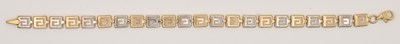 Lot 1437 - A 9ct white and yellow gold bracelet, with...