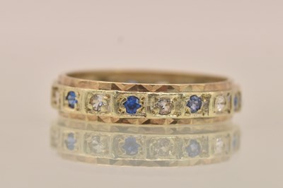 Lot 1279 - A 9ct yellow gold blue and white stone...